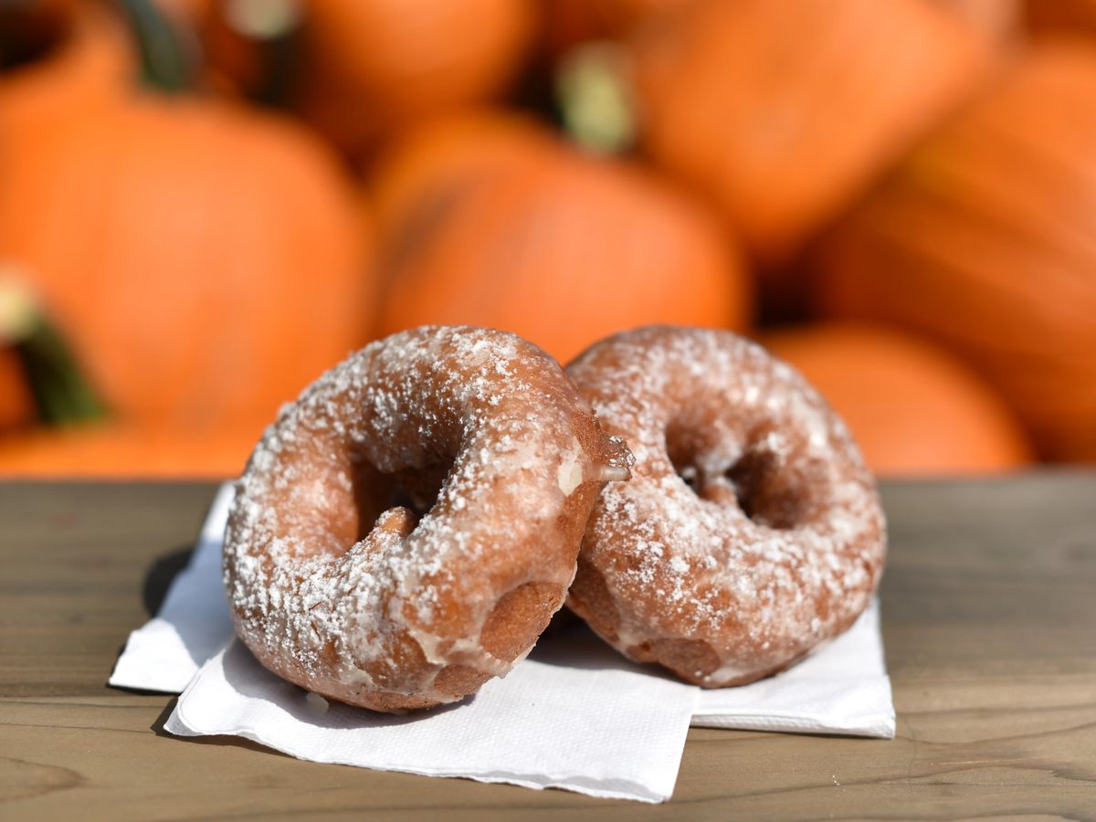 Donuts on board with pumpkins 